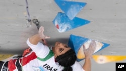 Iranian athlete Elnaz Rekabi competes during the women's Boulder & Lead final during the IFSC Climbing Asian Championships in Seoul, South Korea, Oct. 16, 2022. (Rhea Khang/International Federation of Sport Climbing via AP)