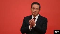 目前排名第二的中共中央政治局常委李强预计将在明年3月全国人大会议上出任中国总理。（2022年10月23日）