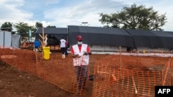 Members of Doctors Without Borders set up an Ebola treatment isolation unit at the Mubende regional referral hospital in Uganda on Sept. 24, 2022. 