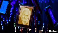 A picture of Ales Bialiatski is added to the Nobel Garden on Oct. 7, 2022, at the Norwegian Nobel Institute to join previous Peace Prize winners. (NTB/Rodrigo Freitas via Reuters)