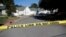 Sahalee Way in Raleigh, N.C., remains closed on Oct. 14, 2022, following a shooting the day before. Police say a 15-year-old boy fatally shot at least two people in a neighborhood, then fled toward a walking trail where he opened fire, killing and wounding others.