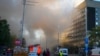 آتش و دود در یکی از خیابان‌های کی‌یف بعد از انفجار پهپاد. آرشیو