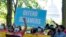 FILE - People rally outside the U.S. Capitol in Washington in support of the Deferred Action for Childhood Arrivals immigration program, Oct. 6, 2022. 