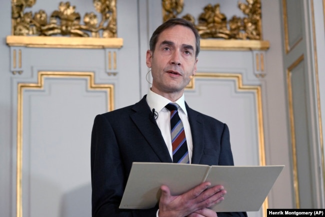 Permanent Secretary of the Swedish Academy Mats Malm announces the 2022 Nobel Prize in Literature, in Borshuset, Stockholm, Sweden, Thursday, Oct. 6, 2022. (Henrik Montgomery/TT News Agency via AP)