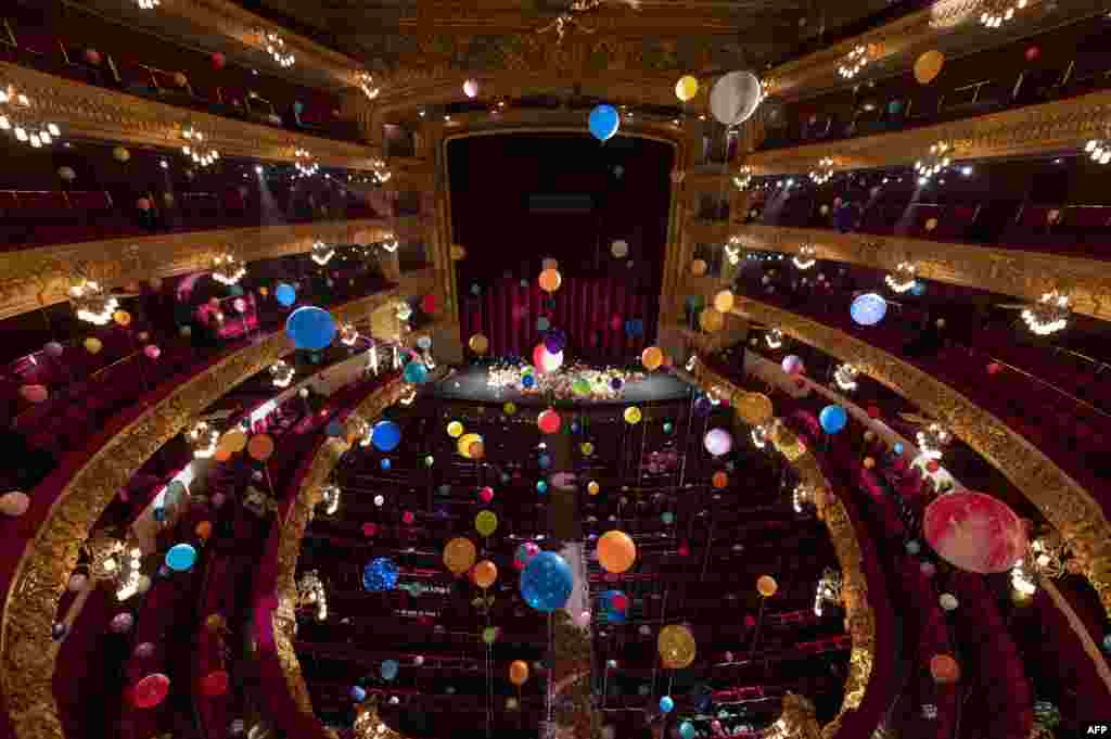 The Liceu Grand Theatre in Barcelona, Spain, is seen filled with balloons as part of an art installation by Brazilian artist Flavia Junqueira.