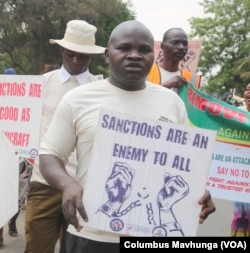 Calvern Chitsunge of the Broad Alliance Against Sanctions joins a protest to demand the removal of sanctions, outside the U.S. embassy in Harare, Zimbabwe, Oct. 19, 2022.