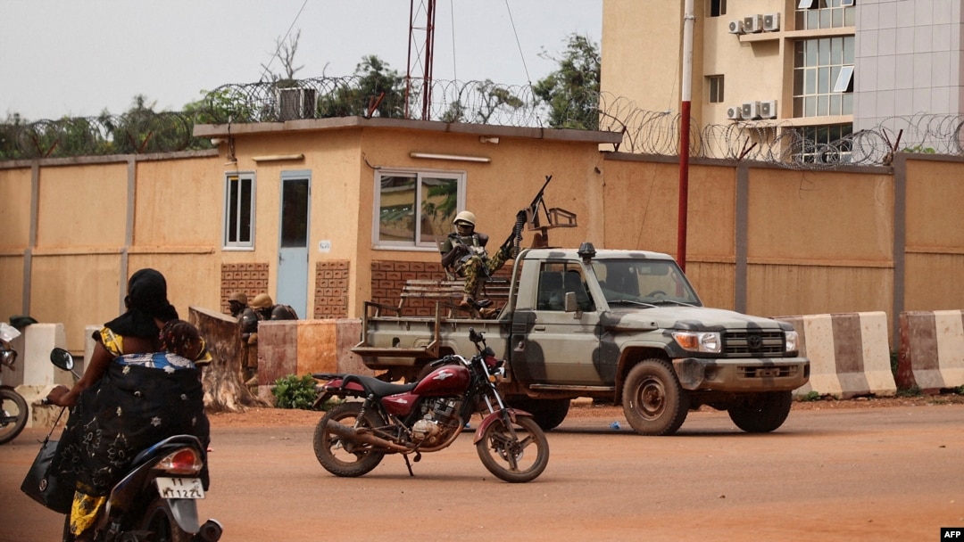 FILE - Burkina Faso soldiers are seen deployed in Ouagadougou, Sept. 30, 2022.