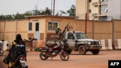 FILE - Burkina Faso soldiers are seen deployed in Ouagadougou, Sept. 30, 2022.