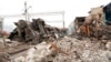 FILE - Debris covers a railway depot ruined after a Russian rocket attack in Kharkiv, Ukraine, Sept. 28, 2022.