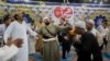 Sufi worshippers perform “Zikr,” a ritual in which they dance to Islamic songs to release stress and connect with Allah and the souls of their ancestors. Al-Sherif, Egypt, Oct. 4, 2022. (Hamada Elrasam/VOA) 