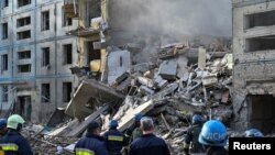 A view shows a residential building heavily damaged by a Russian missile strike in Zaporizhzhia, Ukraine, Oct. 9, 2022.