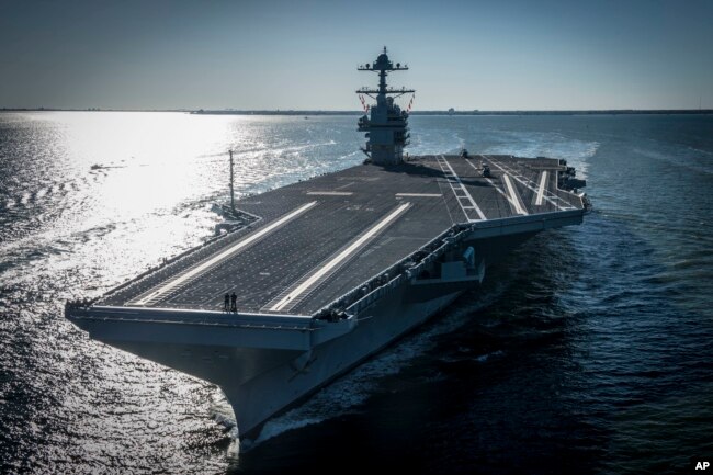 FILE - USS Gerald Ford, the first of the Navy's new class of aircraft carriers conducted sea trials on April 8, 2017. (Mass Communication Specialist 2nd Class Ridge Leoni/U.S. Navy via AP)