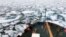 FILE - This summer 2018 photo provided by the National Oceanic and Atmospheric Administration shows the U.S. Coast Guard icebreaker Healy on a research cruise in the Chukchi Sea of the Arctic Ocean.