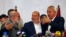 Khalil al-Hayeh, center, of Hamas, attends a press conference with Abdulaziz Minawi, left, of the Islamic Jihad group, and Talal Naji of the Popular Front for the Liberation of Palestine - General Command, right, in Damascus, Syria, Oct. 19, 2022.