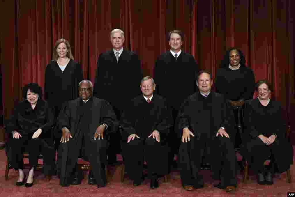 Justices of the U.S. Supreme Court pose for their official photo at the Supreme Court in Washington. Seated from left, Associate Justice Sonia Sotomayor, Associate Justice Clarence Thomas, Chief Justice John Roberts, Associate Justice Samuel Alito and Associate Justice Elena Kagan. Standing from left, Associate Justice Amy Coney Barrett, Associate Justice Neil Gorsuch, Associate Justice Brett Kavanaugh and Associate Justice Ketanji Brown Jackson.