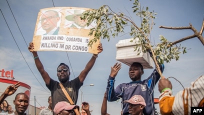 FILE: Anti-Rwanda protesters march to the border of the Democratic Republic of Congo and Rwanda in Goma, DRC. Taken October 31, 2022.