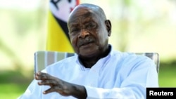 FILE - Uganda's President Yoweri Museveni speaks during an interview at his farm in Kisozi settlement of Gomba district, in the Central region of Uganda, Jan. 16, 2022. 