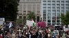 Protestors rally calling for regime change in Iran following the death of Mahsa Amini, a young woman who died after being arrested in Tehran by Iran's notorious "morality police," in Washington, Oct. 1, 2022.