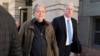 Steve Bannon, center, a longtime ally of former President Donald Trump and convicted of contempt of Congress, accompanied by his attorney Evan Corcoran, right, leaves the federal courthouse in Washington, D.C., Oct. 21, 2022.