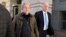 Steve Bannon, center, a longtime ally of former President Donald Trump and convicted of contempt of Congress, accompanied by his attorney Evan Corcoran, right, leaves the federal courthouse in Washington, D.C., Oct. 21, 2022.