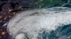 Gambar selebaran satelit Administrasi Kelautan dan Atmosfer Nasional (NOAA) ini menunjukkan Badai Ian pada 30 September 2022 pukul 12:01 UTC. (Handout / NOAA/GOES / AFP)