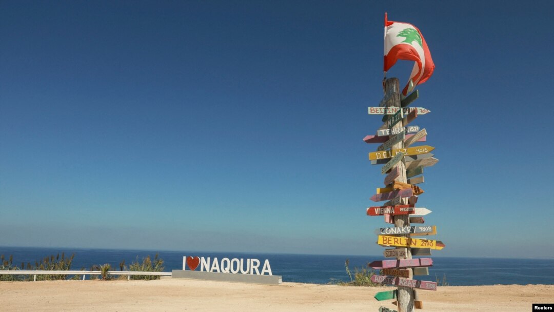 Signs bearing names of cities are pictured in Naqoura, near the Lebanese-Israeli border, southern Lebanon, Oct. 6, 2022. 