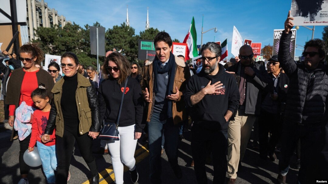 Canada’s Prime Minister Justin Trudeau marches along Alexandra Bridge during a protest in support of women in Iran following the death of Mahsa Amini, in Ottawa, Ontario, Canada Oct. 29, 2022.