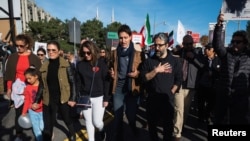 Canada’s Prime Minister Justin Trudeau marches along Alexandra Bridge during a protest in support of women in Iran following the death of Mahsa Amini, in Ottawa, Ontario, Canada Oct. 29, 2022.