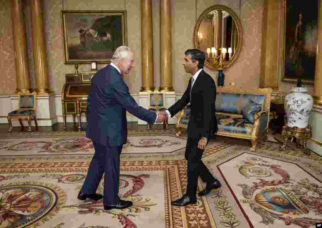 King Charles III welcomes Rishi Sunak during an audience at Buckingham Palace, London, where he invited the newly elected leader of the Conservative Party to become Prime Minister and form a new government.