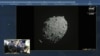 In this image, taken from a NASA live feed on Monday, September 26, 2022, the Dart spacecraft heads directly for asteroid Dimorph. (ASI/NASA via AP)