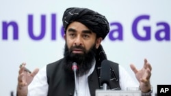 FILE - Zabiullah Mujahid, the spokesman for the Taliban government, speaks during a press conference in Kabul, Afghanistan, June 30, 2022.