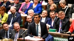 In this handout photo provided by UK Parliament, Britain's Prime Minister Rishi Sunak speaks during Prime Minister's Questions in the House of Commons in London, Oct. 26, 2022.