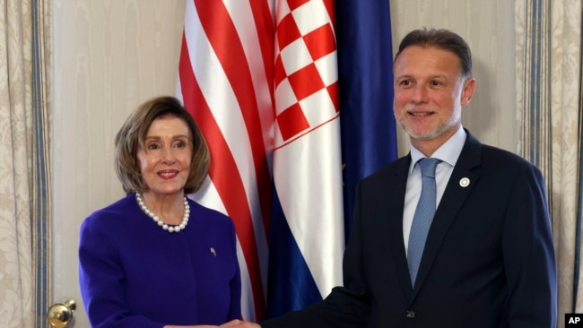 House Speaker, U.S. Representative Nancy Pelosi, left, shakes hands with Speaker of the Croatian Parliament Gordan Jandrokovic, before a two-day summit of European parliaments' speakers with the leaders of Ukraine, in Zagreb, Croatia, Oct. 24, 2022.