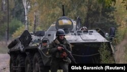 པུ་ཀྲིན་གྱི་མཐུན་གྲོགས་གཙོ་གྲས་གཉིས་ཀྱིས་ཨུ་རུ་སུའི་དམག་དོན་ལས་གཞིར་སྐྱོན་བརྗོད།