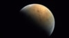 FILE - This image captured by the United Arab Emirates' "Amal" ("Hope") probe shows the planet Mars on Feb. 10, 2021. Ancient Mars may have had an environment capable of harboring an underground world teeming with microscopic organisms, French scientists reported Monday.