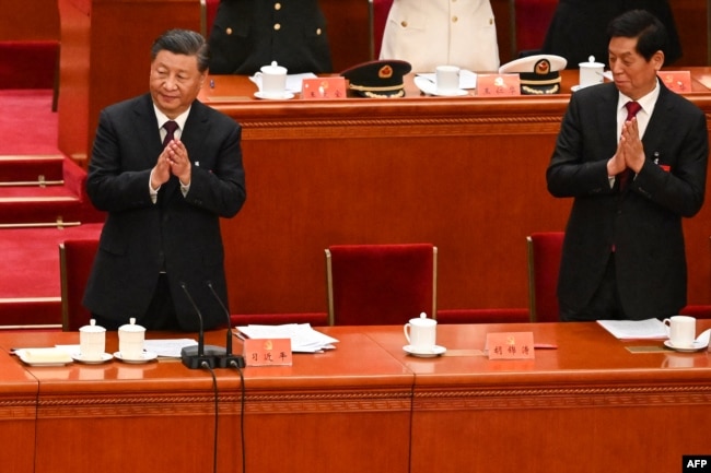 2022年10月22日，在北京人民大会堂举行的中共二十大闭幕式上，前中共总书记胡锦涛被离席后留下的空座位。