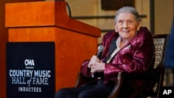 FILE - Jerry Lee Lewis speaks at the Country Music Hall of Fame after it was announced he would be inducted as a member, May 17, 2022, in Nashville, Tenn.