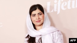 FILE - Nobel peace laureate Malala Yousafzai, pictured at the Variety Power of Women event in Beverly Hills, California, on Sept. 29, 2022, returned to her native Pakistan to visit flood victims on Oct. 11, 2022.
