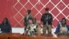 FILE - Burkina Faso's new self-proclaimed leader captain Ibrahim Traore attends a meeting in Ouagadougou on Oct. 2, 2022.