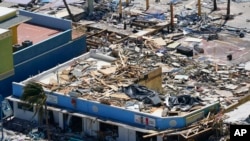 Business are seen in the wake of Hurricane Ian, in Fort Myers Beach, Florida, Sept. 29, 2022.