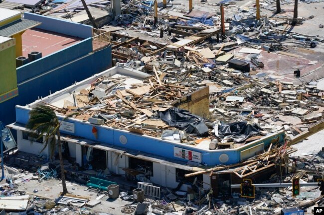 Business are seen in the wake of Hurricane Ian, in Fort Myers Beach, Florida, Sept. 29, 2022.