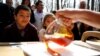 FILE - New Canadian citizen David Alfonso, 8, reacts as maple taffy is prepared for new Canadians following a citizenship ceremony at the Vanier Sugar Shack in Ottawa, Ontario, April 11, 2018. 