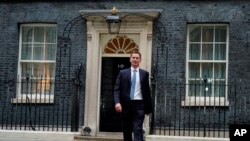 FILE - Jeremy Hunt leaves 10 Downing Street in London after he was appointed Chancellor of the Exchequer, Oct. 14, 2022.