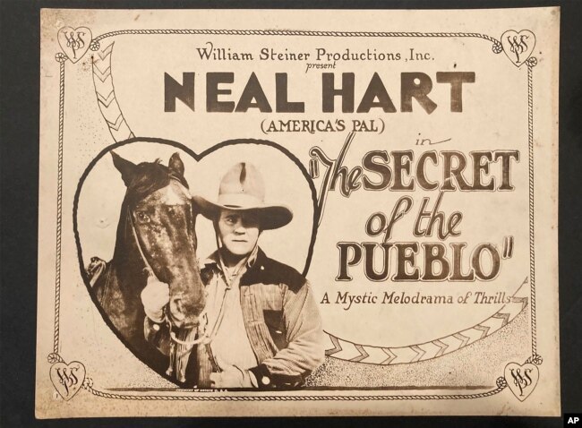 A movie theater lobby card promotes the 1923 silent film "The Secret of the Pueblo." (Photo Courtesy Dwight Cleveland via AP)