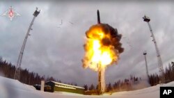 FILE - This photo taken from video provided by the Russian Defense Ministry Press Service on Feb. 19, 2022, shows a YS-24 "Yars" intercontinental ballistic missile being launched from an air field during military drills.