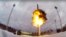 FILE - This photo taken from video provided by the Russian Defense Ministry Press Service on Feb. 19, 2022, shows a YS-24 "Yars" intercontinental ballistic missile being launched from an air field during military drills.