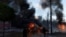 Cars are on fire after Russia's missile attack in Kyiv, Ukraine October 10, 2022. REUTERS/Valentyn Ogirenko/File Photo