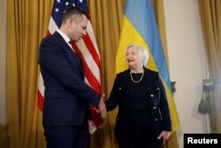 ABD Baliye Bakanı Janet Yellen Ukrayna Maliye Bakanı Serhiy Marçenko ile, 11 Ekim 2022.