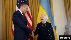 Министры финансов Украины и США: Сергей Марченко и Джанет Йеллен на переговорах в Вашингтоне. 11 октября 2022 года.