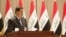 Iraqi Prime Minister-designate Mohammed Shia al-Sudani speaks during a vote on Sudani's cabinet at the parliament in Baghdad, Oct. 27, 2022. (Iraqi Parliament Media Office handout photo)